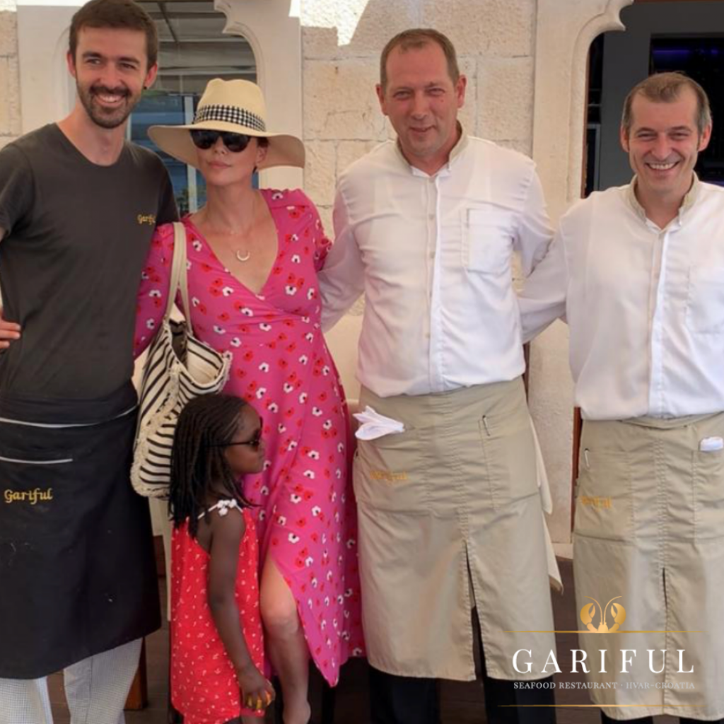 charlize theron in restaurant gariful